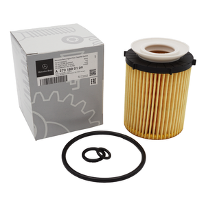 Gelber Ölfilter neben Verpackung 1