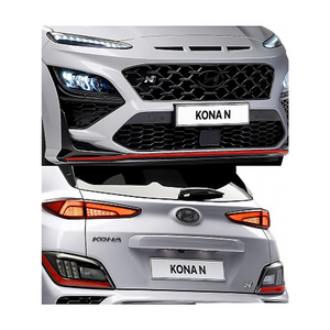 ront- und Rückansicht eines Hyundai Kona N in Grau, mit sportlichem Kühlergrill, roten Akzenten 3